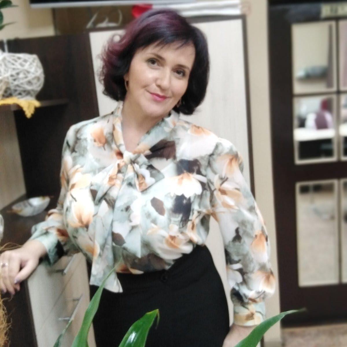 Крила за спиною вчительки з Рівного