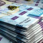 Купка тисячогривневих купюр.