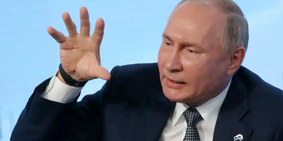 путін