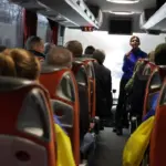 Повернені з білорусі громадяни України в автобусі.