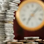 Складені копійки і годинник.