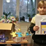 Гімназист із Ходосів вітає поранених нацгвардійців.