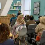 Присутні слухають Галину Данильчук.