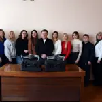 Працівники Городоцької сільради позують з дронами.