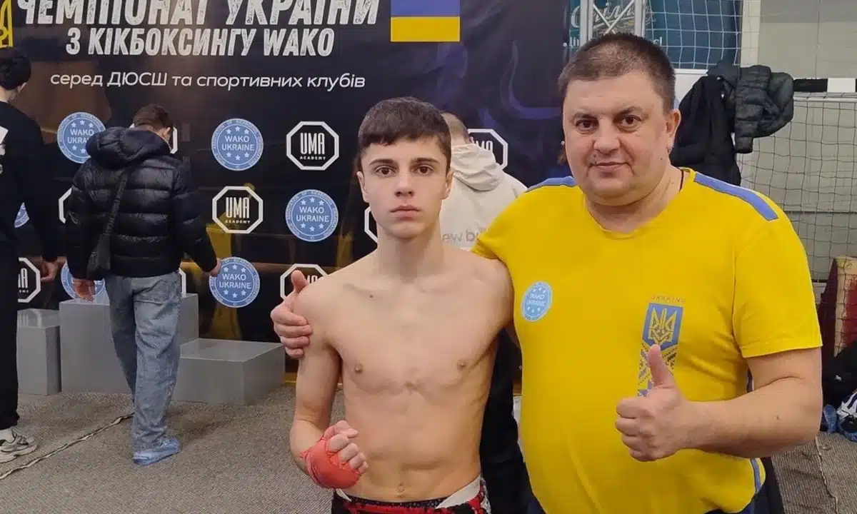 Даниїл Савіцький з тренером.