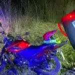 Мотоцикл і алкотестер.